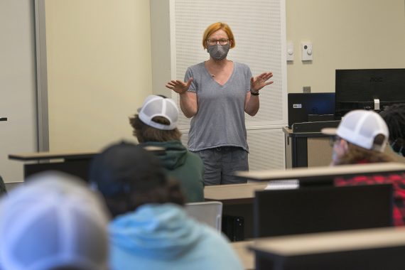 Monika Lawrence teaching students in Memorial Hall.