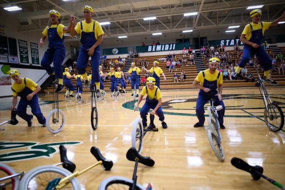 Unicyclists dressed up as Minions from the Despicable Me films perform in the BSU Gymnasium during Unicon 21.