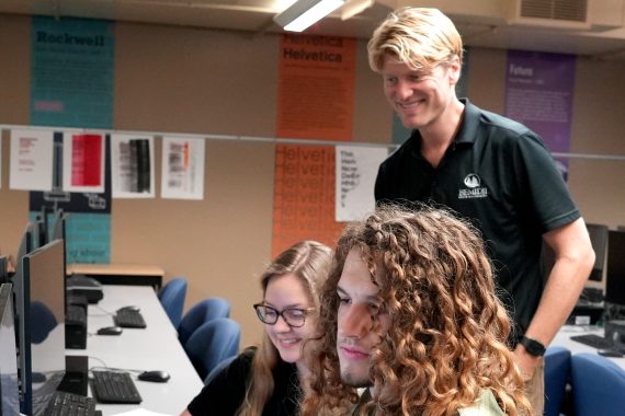 Assistant Professor Eric Carlson with Student Workers Casey Belich and Quinn Knott