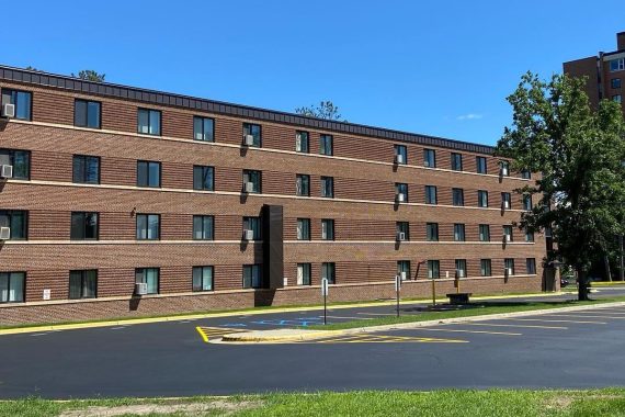 Cedar Apartments and parking lot